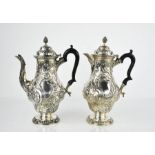 A matched pair of silver coffee and tea pot, London 1904/5, by the Goldsmiths & Silversmiths Co Ltd,