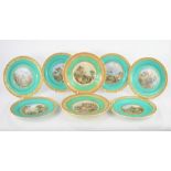 A group of eight 19th century Prattware plates decorated with rustic scenes to include