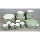 A Denby part dinner service comprising of bowls, plates, casserole dish etc