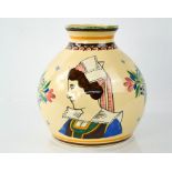 A large French Quimper vase, depicting woman in traditional dress with Breton cap, signed HB Quimper