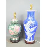 Two Chinese ceramic table lamps with floral and prunus decoration, tallest example 24cm.