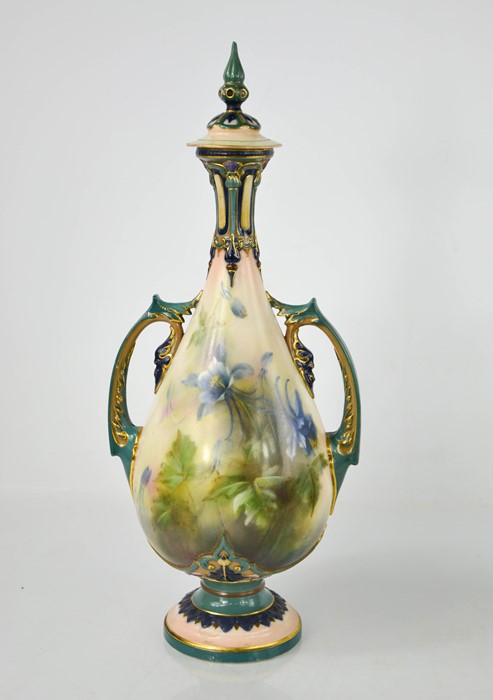 A Royal Worcester vase, with twin handles and cover, by Hadley, painted with blue flowers and