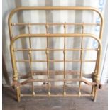 A Victorian brass bed, together with the spring base.