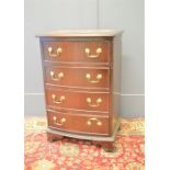 A reproduction chest of drawers