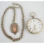 A silver pocket watch and Albert chain and fob, watch hallmarked 0.835 silver