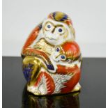 A Royal Crown Derby monkey and baby.