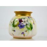 A Royal Worcester money bag shaped vase, painted with violets, date code 1912, 8cm high.