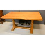 Robert Thompson 'The Mouseman' trestle dining table, with four plank adzed top, above two columns