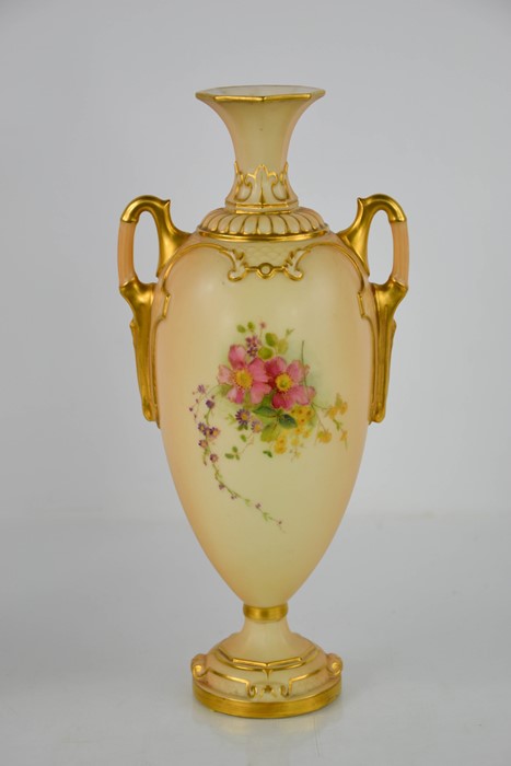 A Royal Worcester blush ivory vase, with twin handles and painted with flowers, 26cm high. - Image 2 of 2
