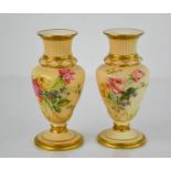 A pair of Royal Worcester blush ivory vases decorated with roses, 15cm high.