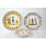 Two French Quimper pottery plates, one of hexagonal form signed Henriot Quimper, the other HB