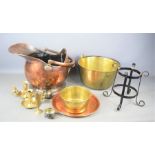 A group of brass and copper ware to include a copper coal bucket, brass jam pan etc
