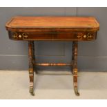 An early Victorian mahogany, rosewood and brass inlaid card table with swivel top, four twist