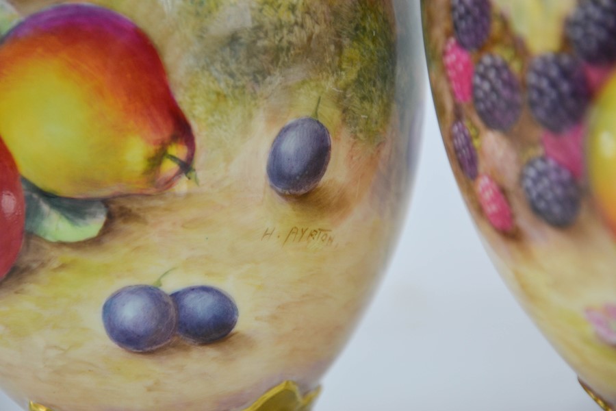 A fine pair of Royal Worcester pot pourri vases with inner and outer covers, painted with fruit on - Image 2 of 3