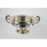An early silver bowl trophy with figured handles and socle foot, Birmingham 1928, 14cm high, 23toz.