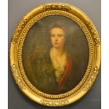 Manner of Godfrey Kneller, an 18th century oval oil on canvas, portrait of a lady in red and green