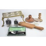 A silver lidded jar and boxed silver spoon together with wooden butter pats, brass trivet etc