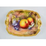A Royal Worcester entre dish, painted with apples, grapes, cherries, and blossom by Horice Price, 18