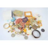 A group of vintage jewellery and collectables to include WWII medals, coins, earrings etc