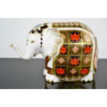 A Royal Crown Derby paperweight, in the form of an elephant.