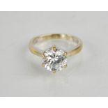A cubic zirconia solitaire dress ring, stamped 750.