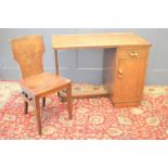 A mid-century desk and chair manufactured in Brazil by Liceu de Artes e Oficios. 100cms long x 55cms