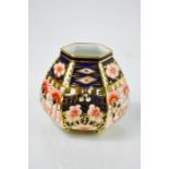 A Royal Crown Derby hexagonal vase in the Old Imari pattern, 9cm high.