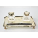 A silver inkstand with two glass inkwells, from the Goldsmiths & Silversmiths Company, Regent