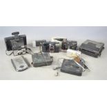 A group of vintage cameras to include Polaroid, Canon sure shot etc