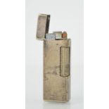 A vintage Dunhill rollagas lighter