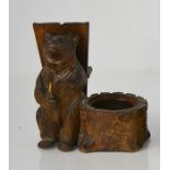 A mid 20th century blackforest bear ashtray, pen holder and matchbox holder,