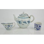 An early Chinese blue and white tea pot, a Delft blue and white jug and a pot. A/F