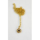 A 9ct gold chain link necklace with swirl pendant, 2.9g.