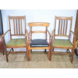 Two oak carver chairs together with an Oak tripod tilt table