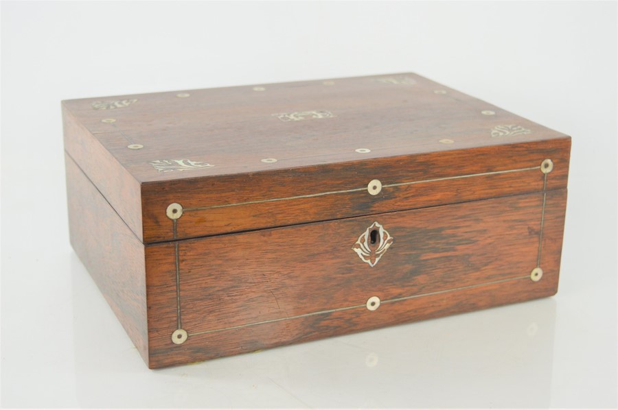 A 19th century rosewood box decorated with mother of pearl, 30cm by 22cm by 12cm