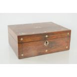 A 19th century rosewood box decorated with mother of pearl, 30cm by 22cm by 12cm
