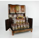 A fine 19th century French burr walnut and ebony boule work decanter box fitted with sixteen glasses