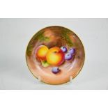 A Royal Worcester pin dish, painted with apples and cherries, signed, 10cm diameter.