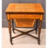 A Victorian games/sewing table, with swivel top revealing blue baise card table, single drawer,