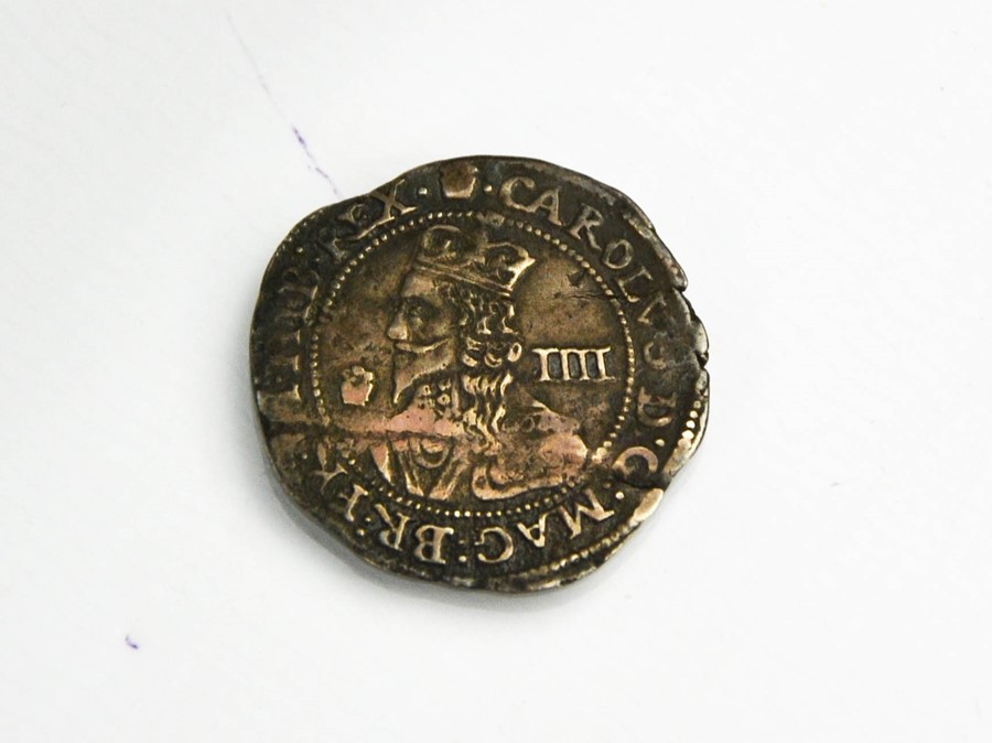 A silver King Charles I groat, four pence, year of issue 1646, inscribed with the King Charles