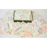 A large quantity of Australian stamps in individual packets of a hundred dating from 1950s and