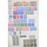 A stamp album of British and worldwide stamps, King George V to Queen Elizabeth II