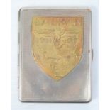 A cigarette case with a Balkan 1944-1945 battle shield badge on the front