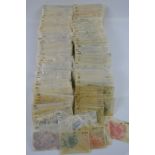 A group of Ceylon stamps in individual packets of fifty and a hundred dating from 1886 to 1935,