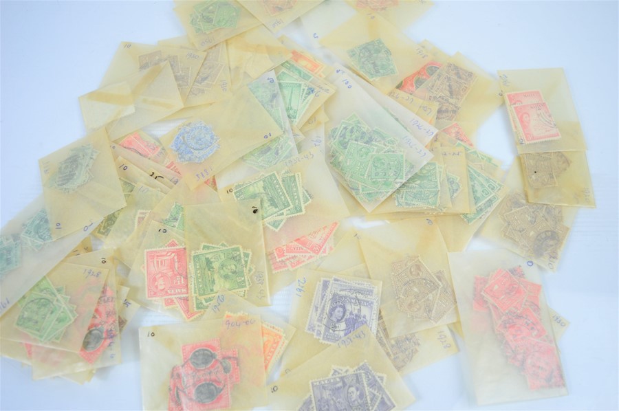 A group of stamps from Malta in individual packets of ten dating from 1904 to 1930s