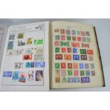 Two albums containing a comprehensive collection of British and worldwide stamps, some early and