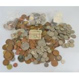 A group of British and some worldwide coins to include some silver and Victorian examples
