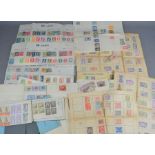 A selection of British and worldwide stamps, some early examples and mint blocks