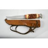 A vintage sheath knife.