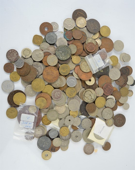 A group of worldwide coins to include some early and silver examples and a medieval jeton